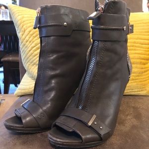 Real leather heels. With snake skin on the back.